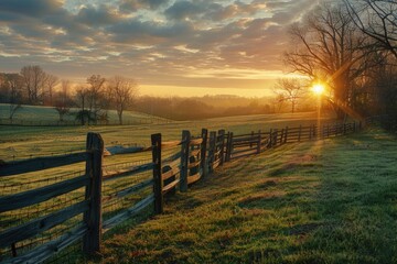 Obraz premium A wooden fence with a beautiful sunset backdrop