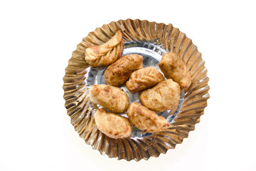 Golden Fried Momos on White backdrop
