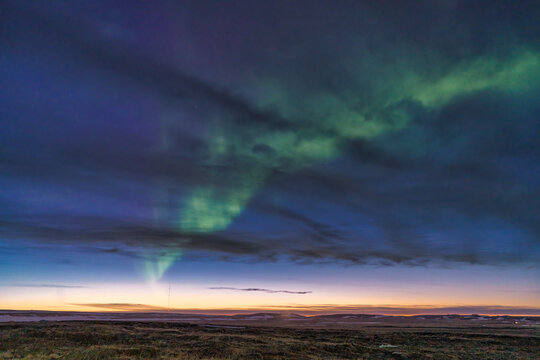 Sunset and Aurora,a rare sight.  .Also visible is the Hellissandur longwave radio mast (Icelandic: Langbylgjust&ouml;&eth;in &aacute; Gufusk&aacute;lum)  which is 412 m tall&hellip; Snaefellsnes peninsula, Iceland