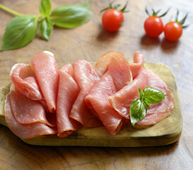 smoked ham of pork on a wooden board