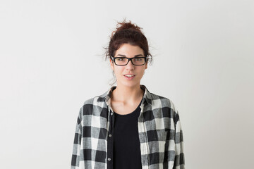 portrait of young hipster pretty woman in checkered shirt