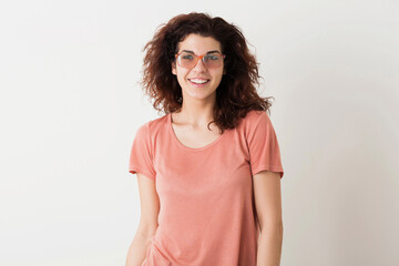 Fototapeta premium portrait of young natural looking smiling happy hipster pretty woman in pink shirt
