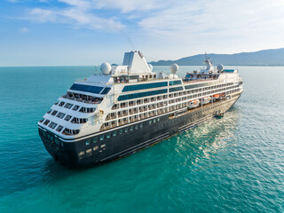 Aerial view beautiful large cruise ship at sea, Big blue passenger cruise liner ship. Concept smart...