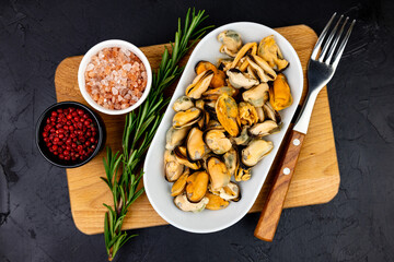 Mussels with herbs and spices close up seafood top view