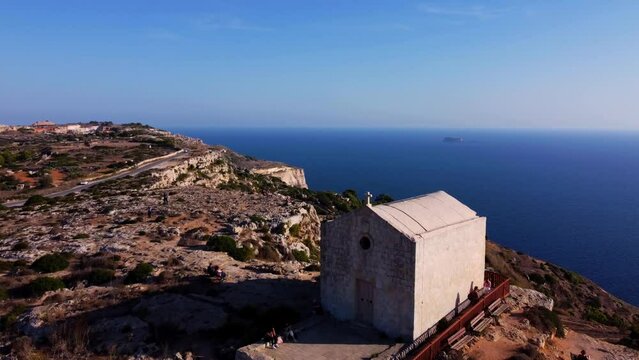 Aerial view of the beautiful white cliffs in Malta, Chapel of St. Mary Magdalene

