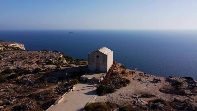 Aerial view of the beautiful white cliffs in Malta, Chapel of St. Mary Magdalene
