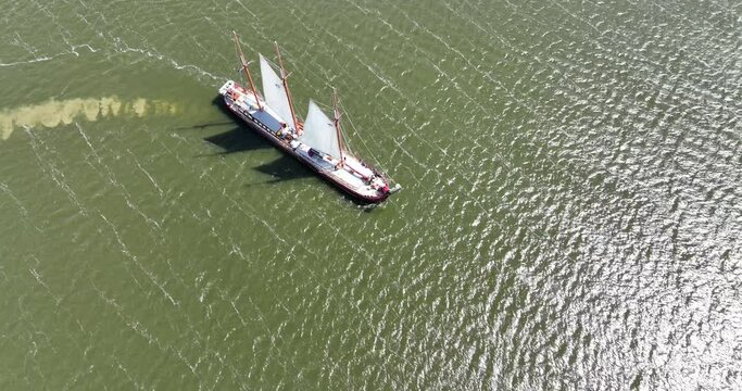 Large historic sailing ship, De Radboud. Ijsselmeer, The Netherlands. Aerial view.