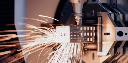 Automatic CNC machine Laser for cut of metal profile of square section with light spark. Concept...