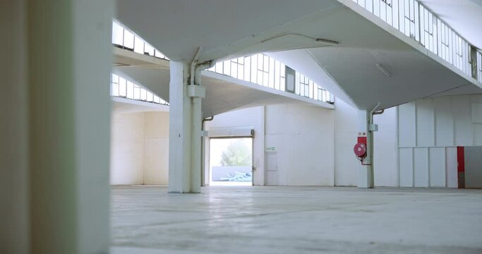 Construction, room and interior of building with warehouse for architecture, industry and workshop. Industrial, structure and empty factory with wall for engineering, commercial property and floor