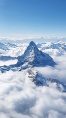 distance view of peak of matterhorn mountain with fluffy whitw clouds on blue sky background