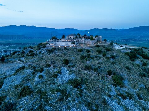 Aerial image of Lekuresi Castle build in 1537 on the top of a hill, in Sarande, southern Albania. 