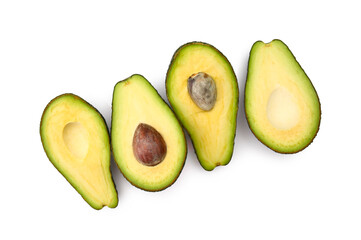 Halves of tasty ripe avocados on white background
