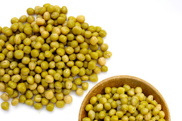 Canned green peas on white background.