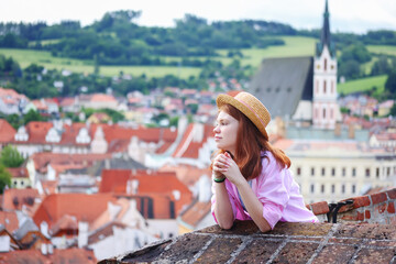 portrait of red head girl enjoy the view on Cesky Krumlov