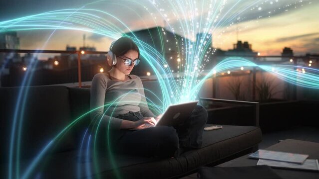 Woman working on laptop at rooftop in the evening with light streams around her. Visualization of the Internet by information lines flying to the global digital network
