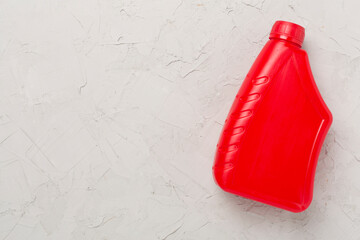 Machine oil on concrete background, top view