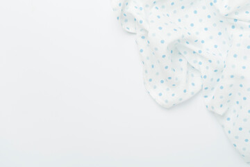 Cotton fabric on color background, top view