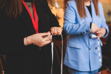 Process of checking in on a conference congress forum event, registration desk table, visitors and...