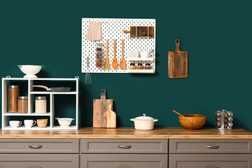 Stylish kitchen with pegboard and kitchenware