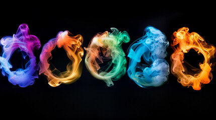 Five colorful smoke rings form a row against a black background. The rings are brightly colored, creating a visually interesting image