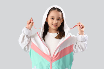 Portrait of fashionable little girl on white background © Pixel-Shot