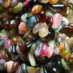 Tourmaline. Texture of stone jewelry. Selective focus