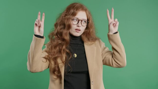 Sarcastic BusinessWoman. hands two fingers air quotes gesture on green, sarcasm