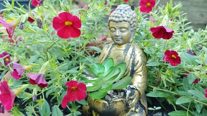 statue of a person in garden