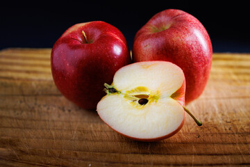 apples on wooden table
