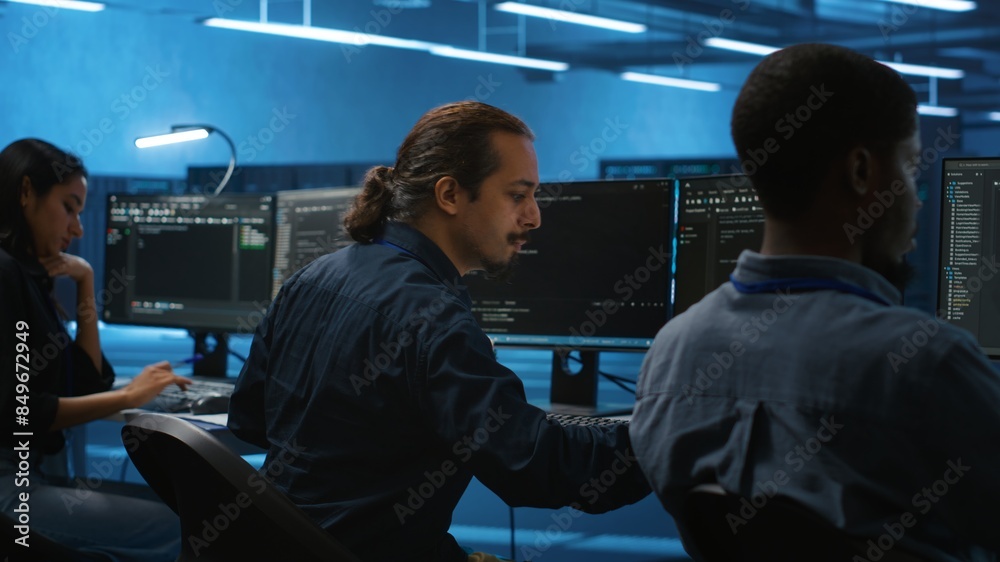 Poster multiracial coworkers in data center coding and checking parameters on computer. multiethnic team wo