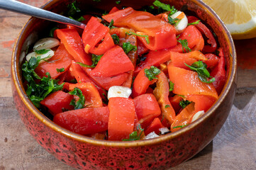 Grilled red peppers, sweet paprika salade with fresh garlic and parsley