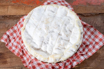 French soft Camembert cheese, original Camembert de Normandie, with white mold