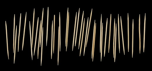 Set wooden toothpicks isolated on black, clipping