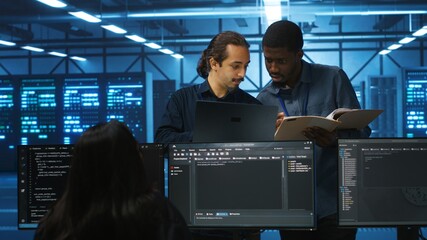 Inspector overseeing server room, reading paperwork and evaluating work done by multiracial team. Supervisor doing inspection in data center, examining hardware performance and workers output