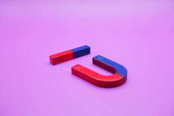 horseshoe magnets and bar magnets isolated on a purple background