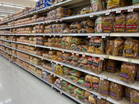 Salt Lake City, Utah, USA - June 27, 2023: Variety of bread loaves on the shelves in a supermarket. Salt Lake City, Utah, USA.