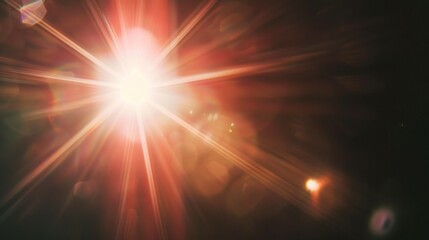 Obraz premium A bright light shining on a dark background, lens flare effects for overlay designs
