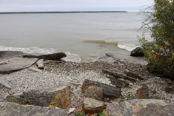 large blocks of limestone discarded from a quarry on lakeshore
