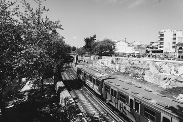 A train near Royal Stoa in Athens, Greece. 