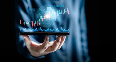 Businesswomen use smartphone apps for scan radar to find stock in stock markets, uptrends, growth economics, business strategy development, and find opportunities for investment.