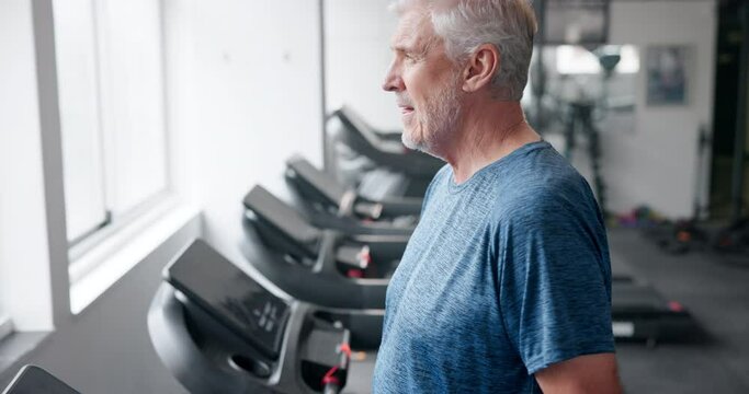 Fitness, senior man and walking on treadmill in gym for cardio workout, endurance training or routine. Wellness, healthy body and elderly person with machine for exercise, performance or commitment