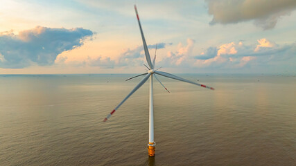 Landscape with Turbine Green Energy Electricity, Windmill for electric power production, Wind turbines generating electricity on ocean at Ba Dong, Tra Vinh, Vietnam. Clean energy concept.