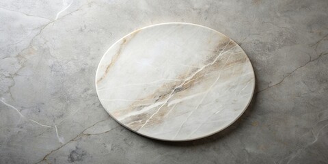 Top down view of a light coloured marble platter round stage on top of a rough cement counter, luxury, marble, platter, stage