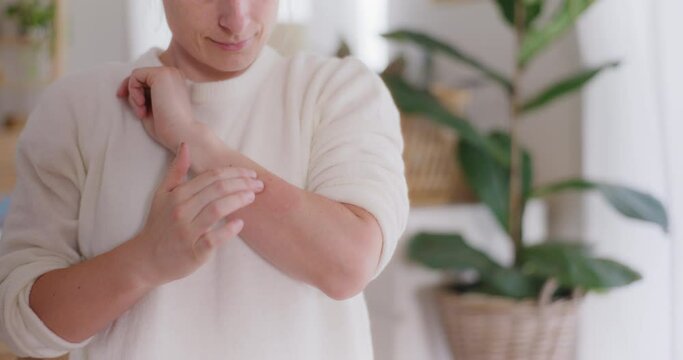 A Woman Applies a Gel That Relieves Pain After a Wasp Sting