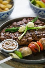 steak served on a plate menu shoot middle eastern style 
