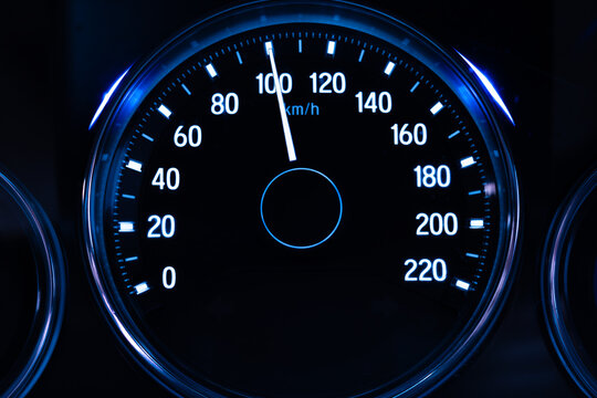 Digital car speedometer needle, high speed 100 kilometers per hour. Technology and transportation concepts