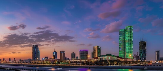 Cityscape with Illuminated Towers at Twilight