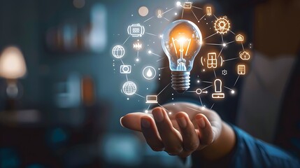 business hand holding illuminated light bulb, idea, innovation and inspiration concept.concept of creativity with bulbs that shine glitter, creativity with bulbs that shine glitter.Inspiration of idea