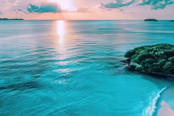 Obraz premium Tranquil tropical beach sunset with clear turquoise waters and islands on horizon, pink and purple skies reflecting off calm ocean waves.