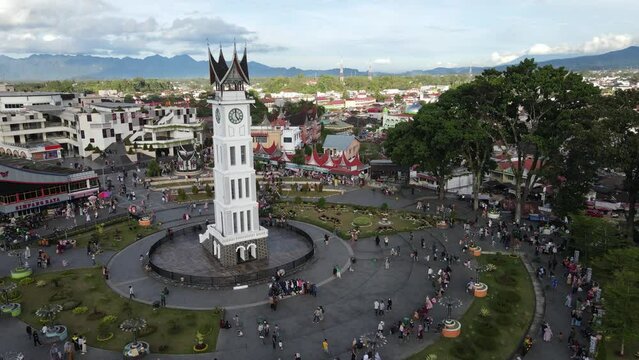 Aerial view of Jam Gadang, a historical and most famous landmark in Bukit Tinggi City, West Sumatera, Indonesia. An icon of the city and the most visited tourist destination by tourists.